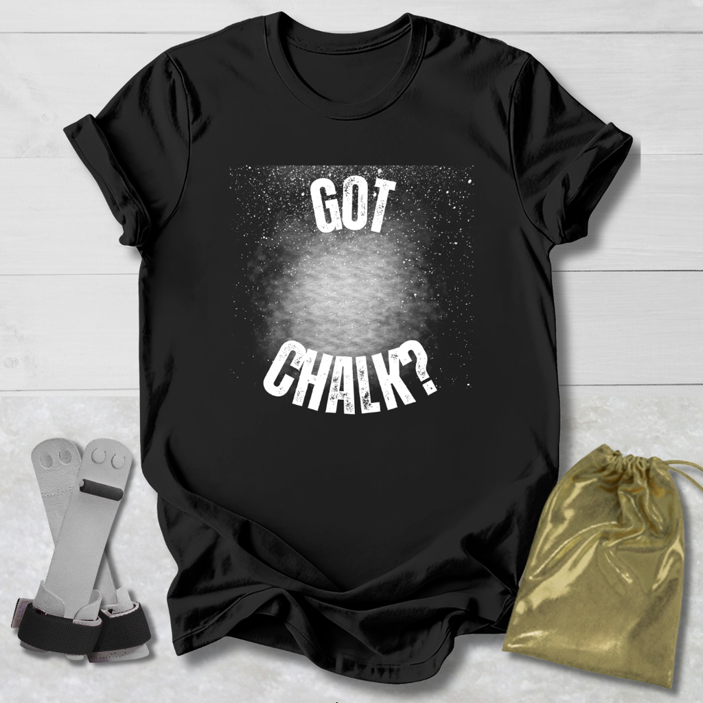 Black t-shirt with 'Got Chalk?' text on a light wooden surface with socks and a drawstring bag.