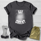 Gray t-shirt with 'Got Chalk?' text, chalk, and drawstring bag on a light wooden surface