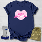 Navy blue t-shirt with pink heart  and I love long practices gymnast text, socks, and drawstring bag on a light wooden surface