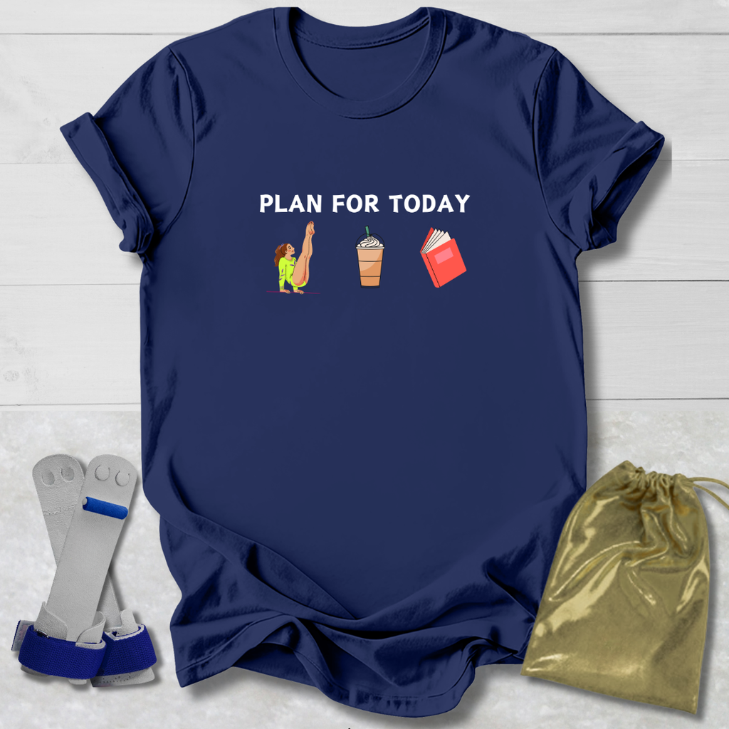 Navy blue t-shirt with 'Gymnast Plan for Today' text and icons on a light wooden surface.
