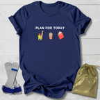 Navy blue t-shirt with 'Gymnast Plan for Today' text and icons on a light wooden surface.