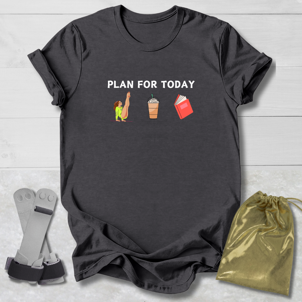 Black t-shirt with 'Gymnast Plan for Today' text and icons, socks, and drawstring bag on a light wooden surface.