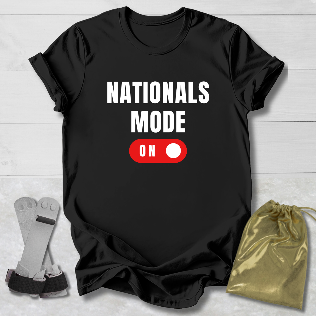 Black t-shirt with 'NATIONALS MODE ON' text and red toggle switch graphic on a light wooden surface.