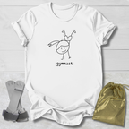 White t-shirt with a gymnast graphic and 'gymnast' text, paired with socks and a drawstring bag on a light wooden surface.