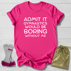 Pink t-shirt with text, socks, and drawstring bag on a light wooden surface