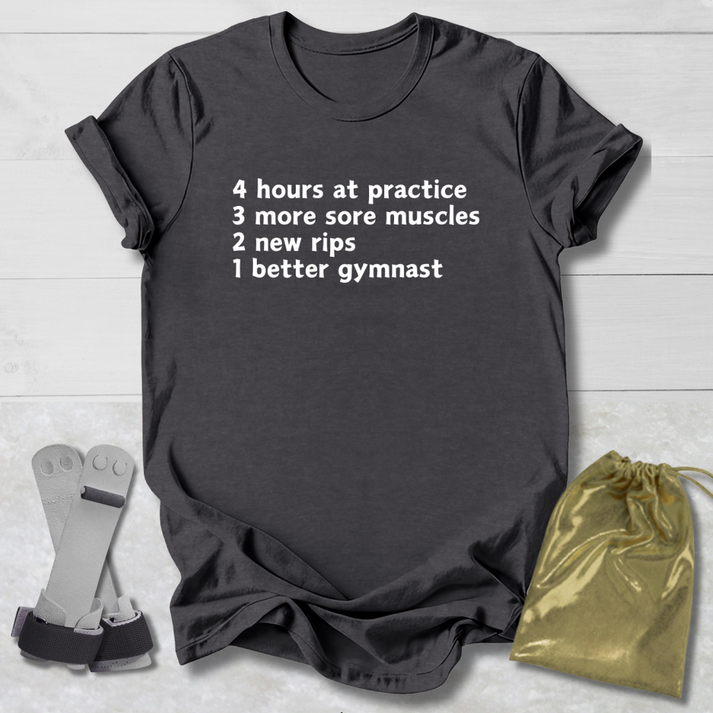 Black t-shirt with humorous text on a light wooden surface with socks and a drawstring bag.