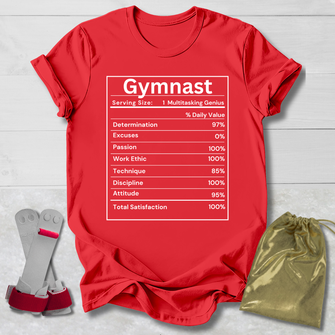 Red t-shirt with 'Gymnast' graphic, socks, and drawstring bag on a light wooden surface