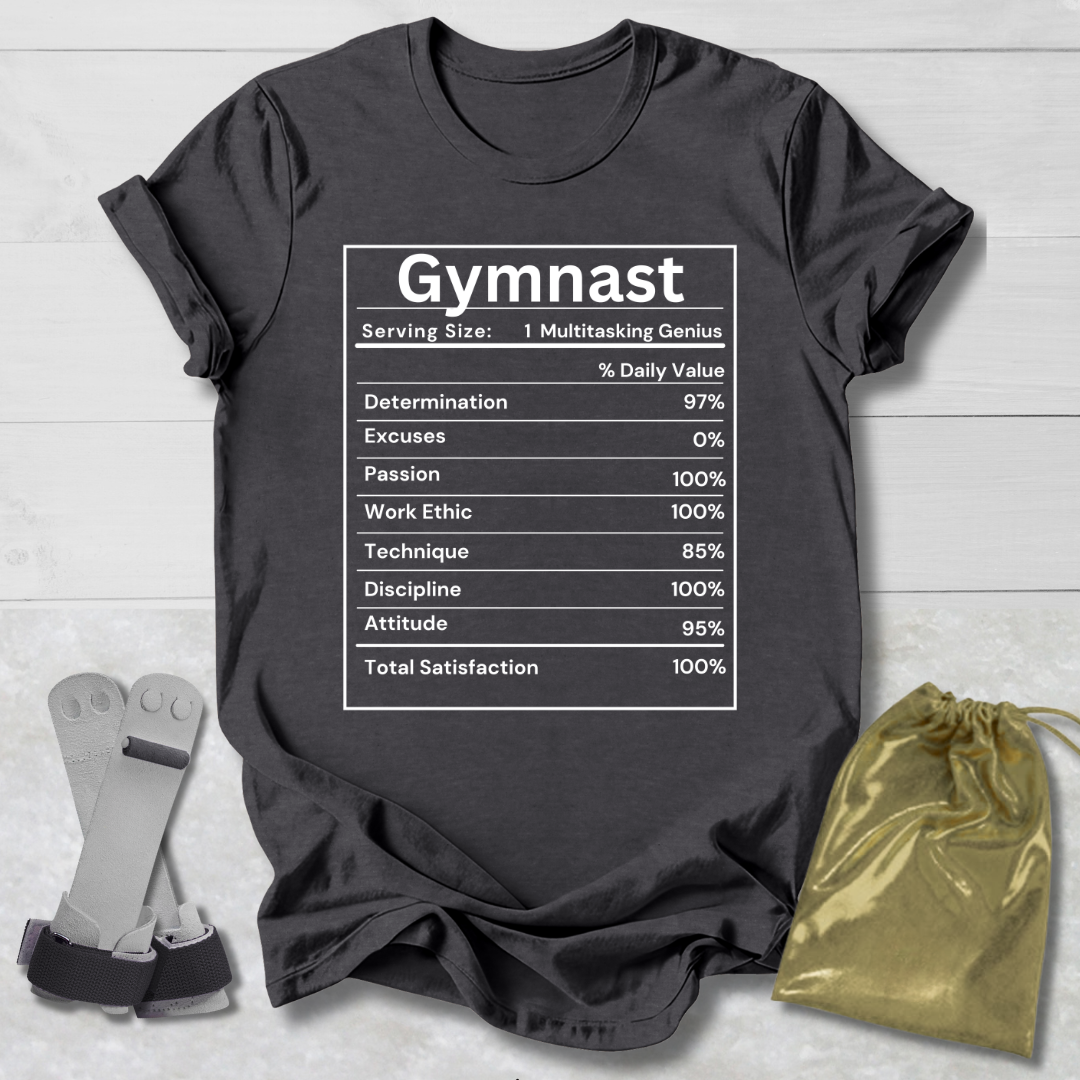 Black t-shirt with 'Gymnast' graphic on a wooden surface with socks and a drawstring bag.