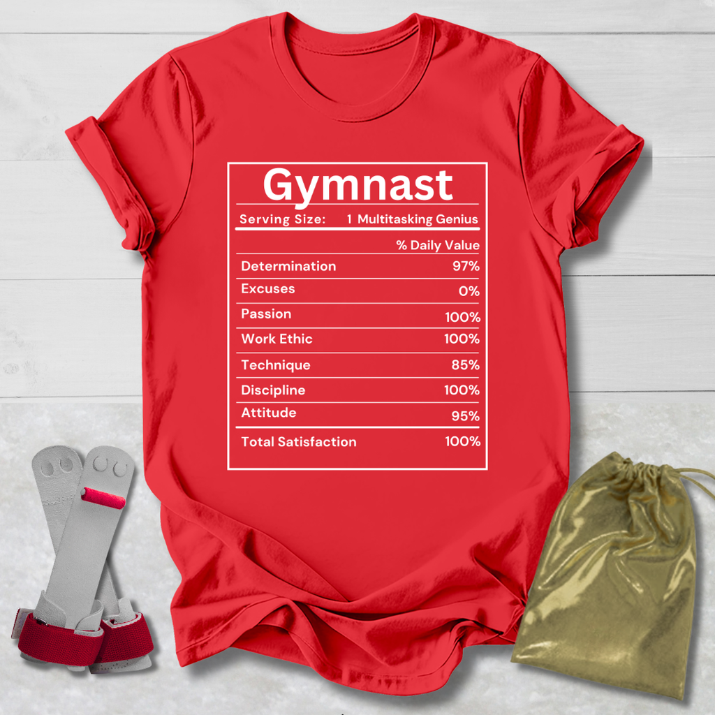 Red t-shirt with 'Gymnast' graphic, socks, and drawstring bag on a light wooden surface