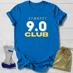 Blue t-shirt with 'GYMNAST 9.0 CLUB' text, socks, and drawstring bag on a light wooden surface