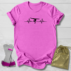 Pink t-shirt with a graphic  gymnast heartbeat design, socks, and a drawstring bag on a light wooden surface.