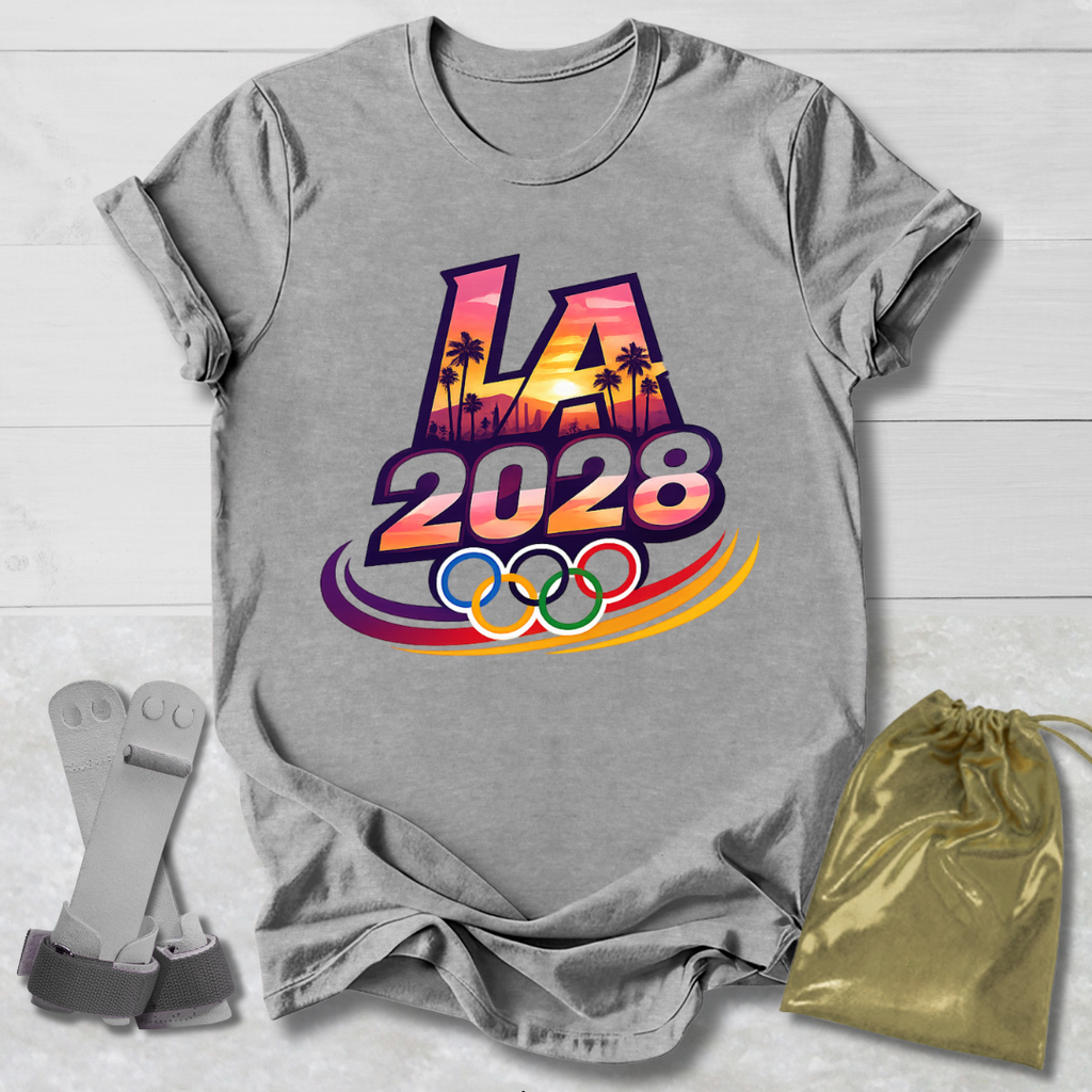 Gray t-shirt with 'LA 2028' design, socks, and drawstring bag on a light wooden surface