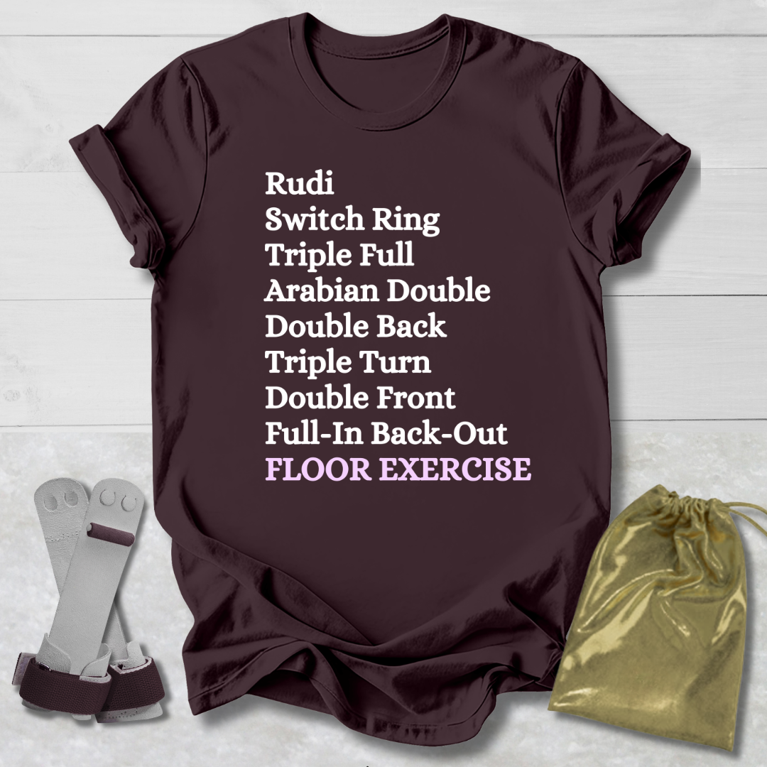 Brown t-shirt with floor exercise skills text, socks, and drawstring bag on a light wooden surface