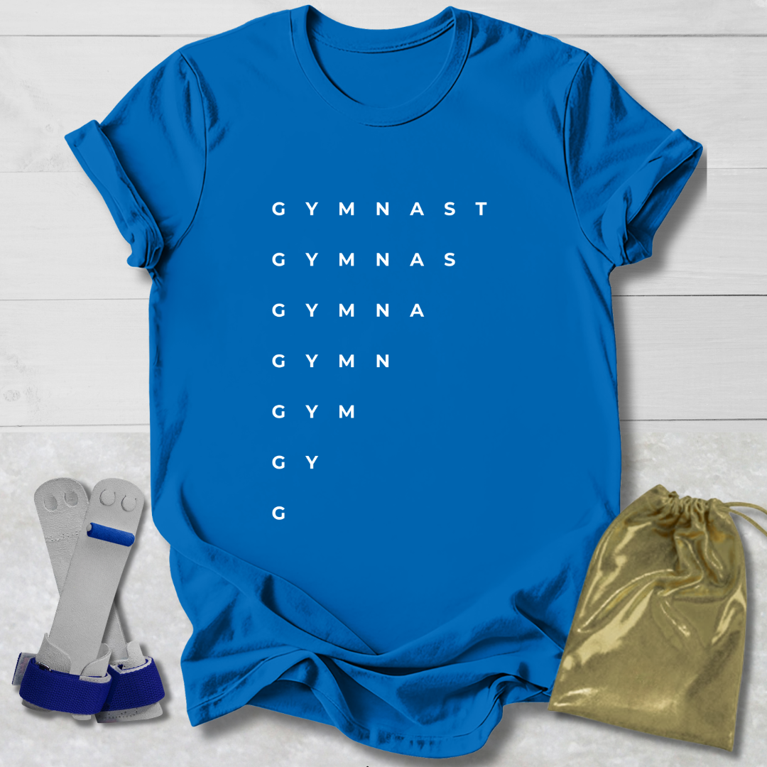 Blue t-shirt with 'GYMNAST' text, socks, and drawstring bag on a light wooden surface