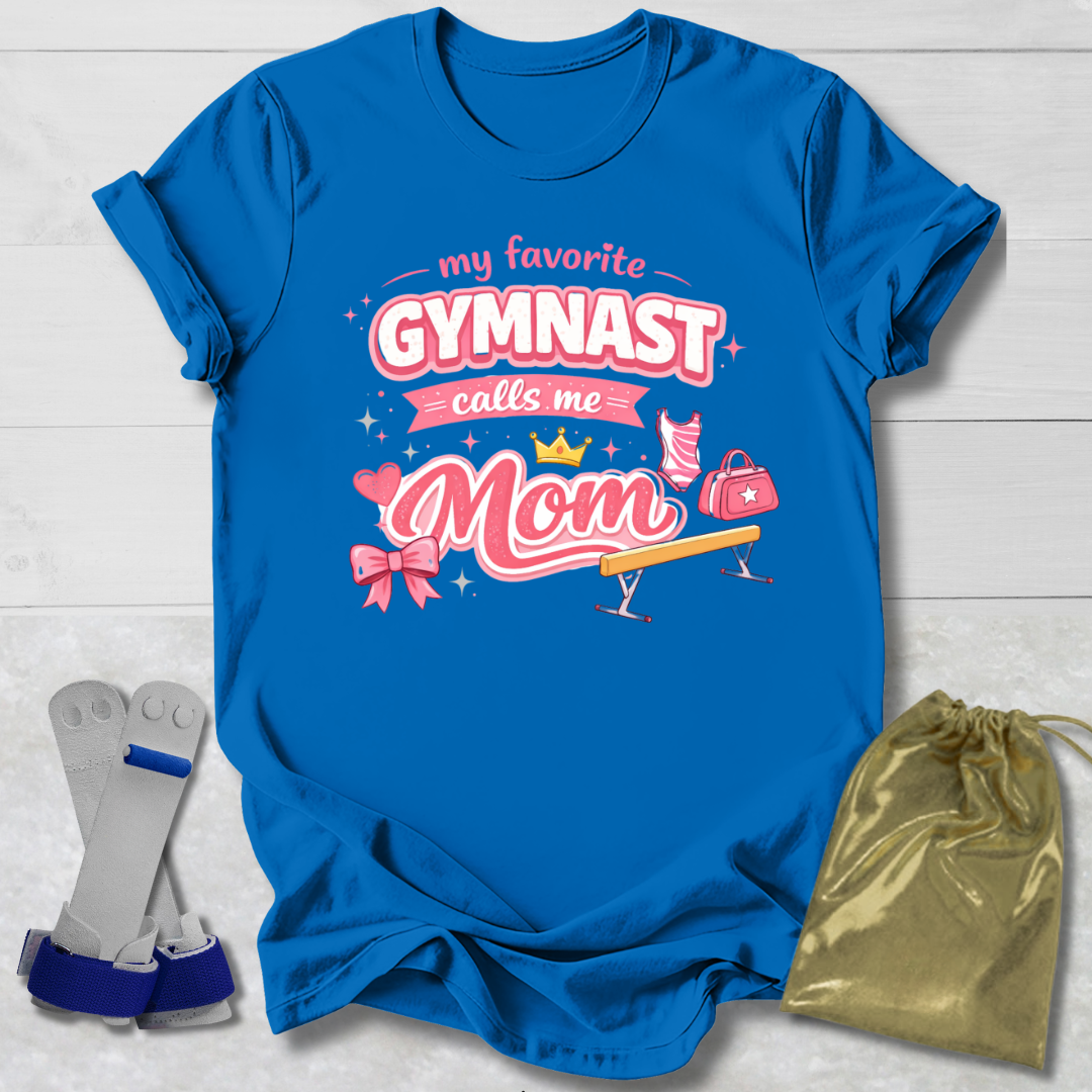 Blue t-shirt with 'My favorite gymnast calls me Mom' text, socks, and drawstring bag on a light wooden surface.