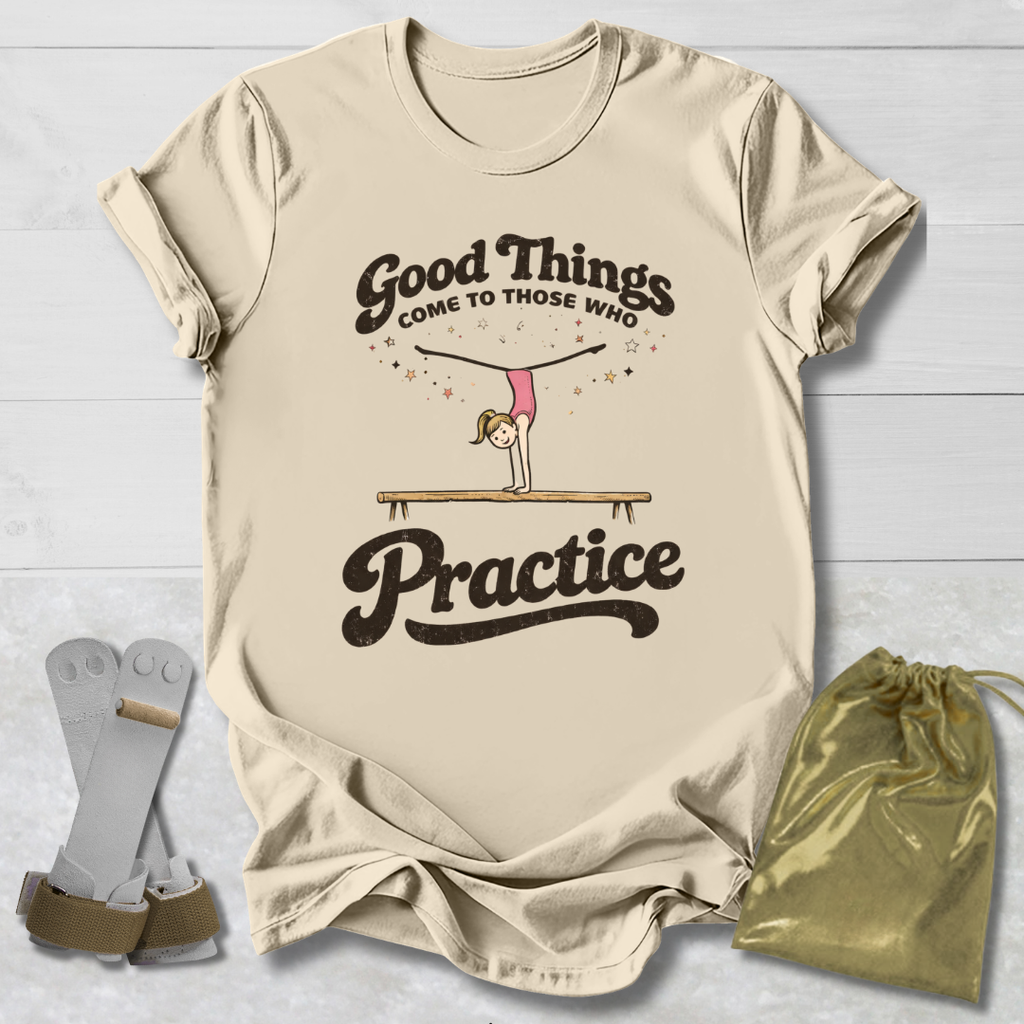 Beige t-shirt with motivational quote and graphic, socks, and drawstring bag on a light wooden surface.