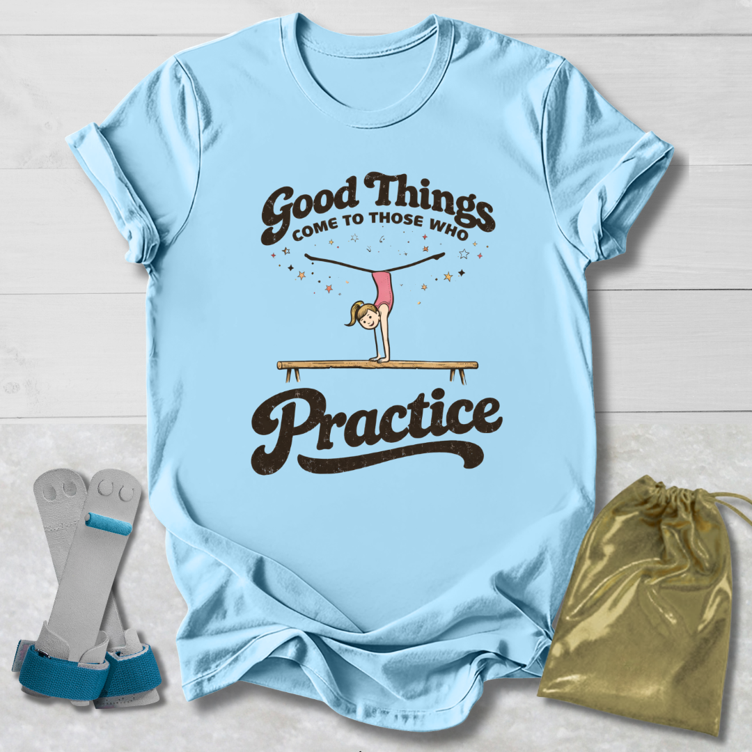 Light blue t-shirt with motivational quote, socks, and drawstring bag on a wooden surface