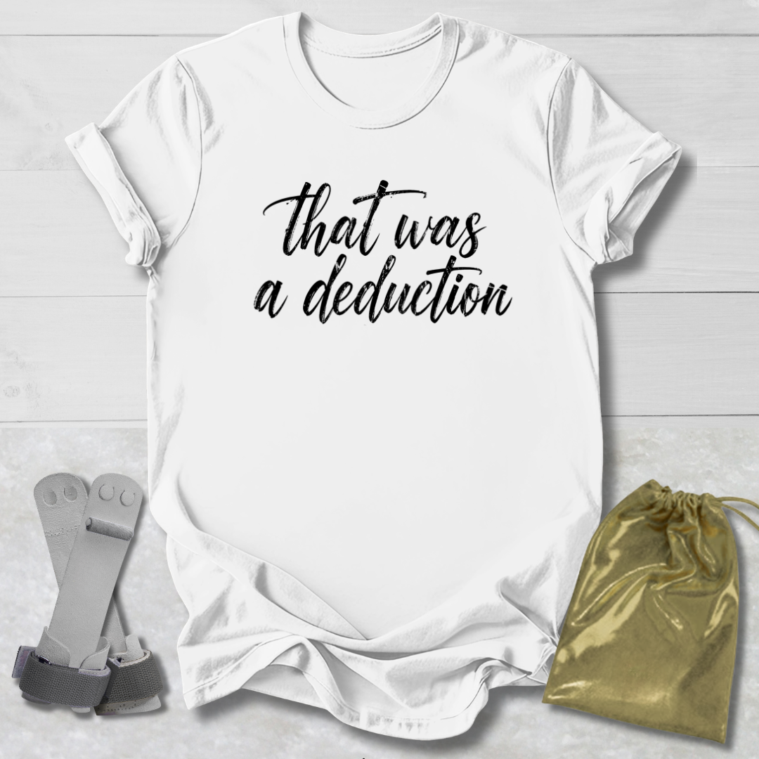 White t-shirt with 'That was a deduction' text, socks, and drawstring bag on a light wooden surface