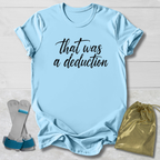 Light blue t-shirt with 'That was a deduction' text, socks, and drawstring bag on a light wooden surface