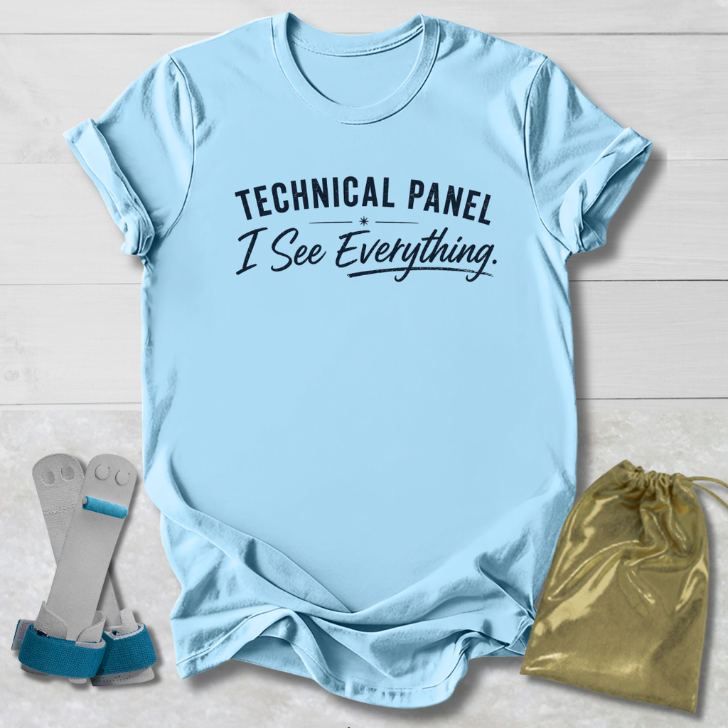 Light blue t-shirt with 'Technical Panel I See Everything' text, socks, and drawstring bag on a light wooden surface.