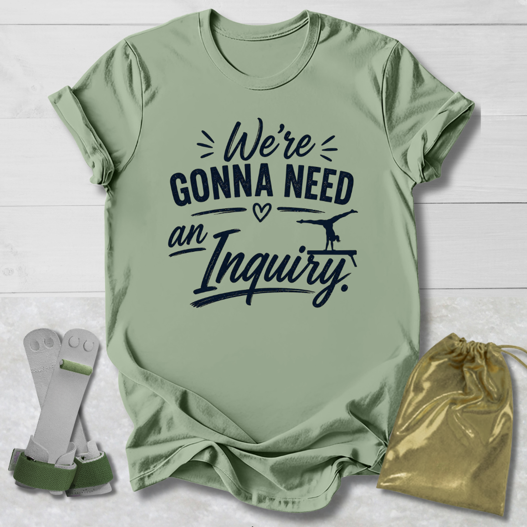 Green t-shirt with text, socks, and drawstring bag on a light wooden surface