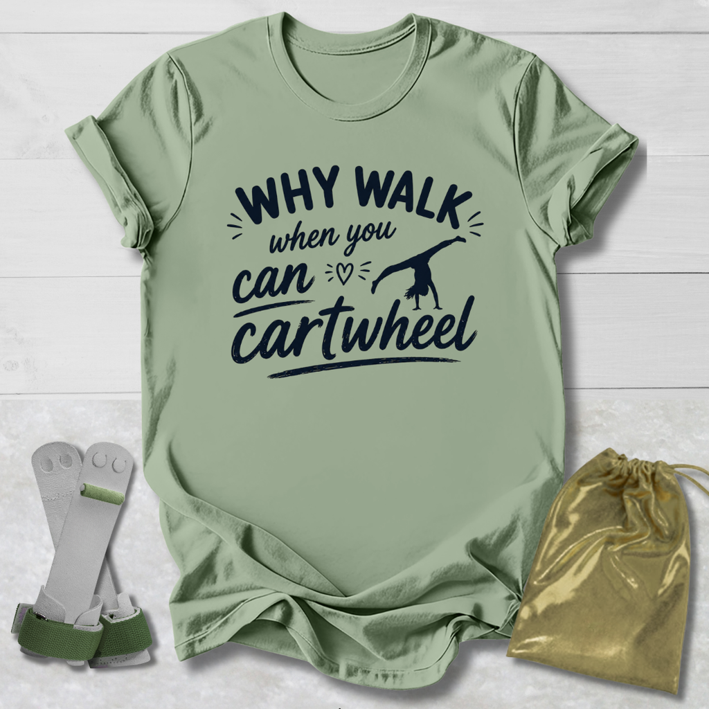 Green -shirt with 'Why walk when you can cartwheel' text, socks, and drawstring bag on a light wooden surface.