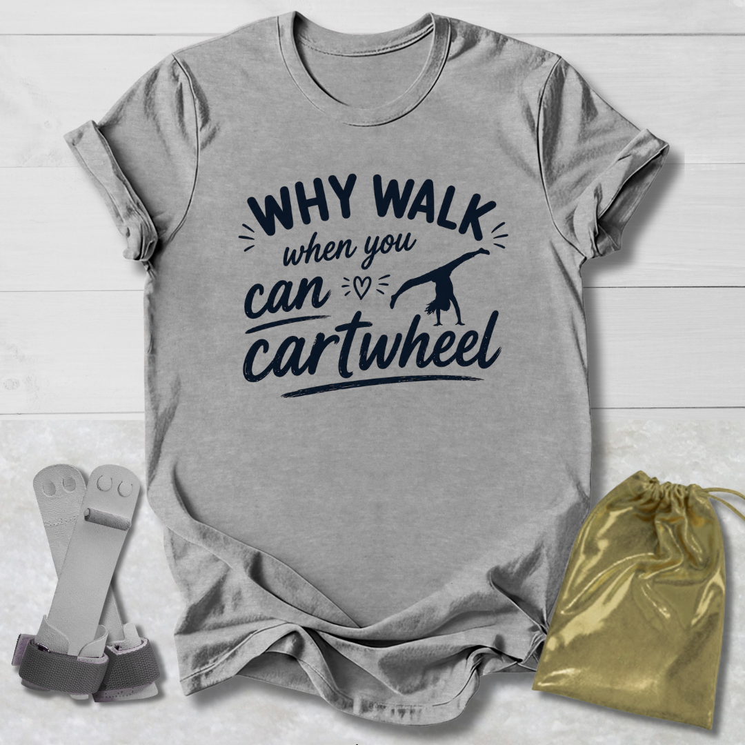 Gray t-shirt with 'Why walk when you can cartwheel' text, socks, and drawstring bag on a light wooden surface.