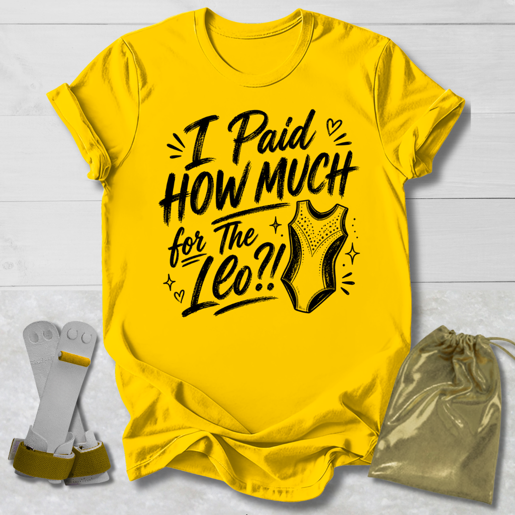 Yellow t-shirt with I paid how much for the gymnastics leotard?!  text and graphic, socks, and drawstring bag on a light wooden surface