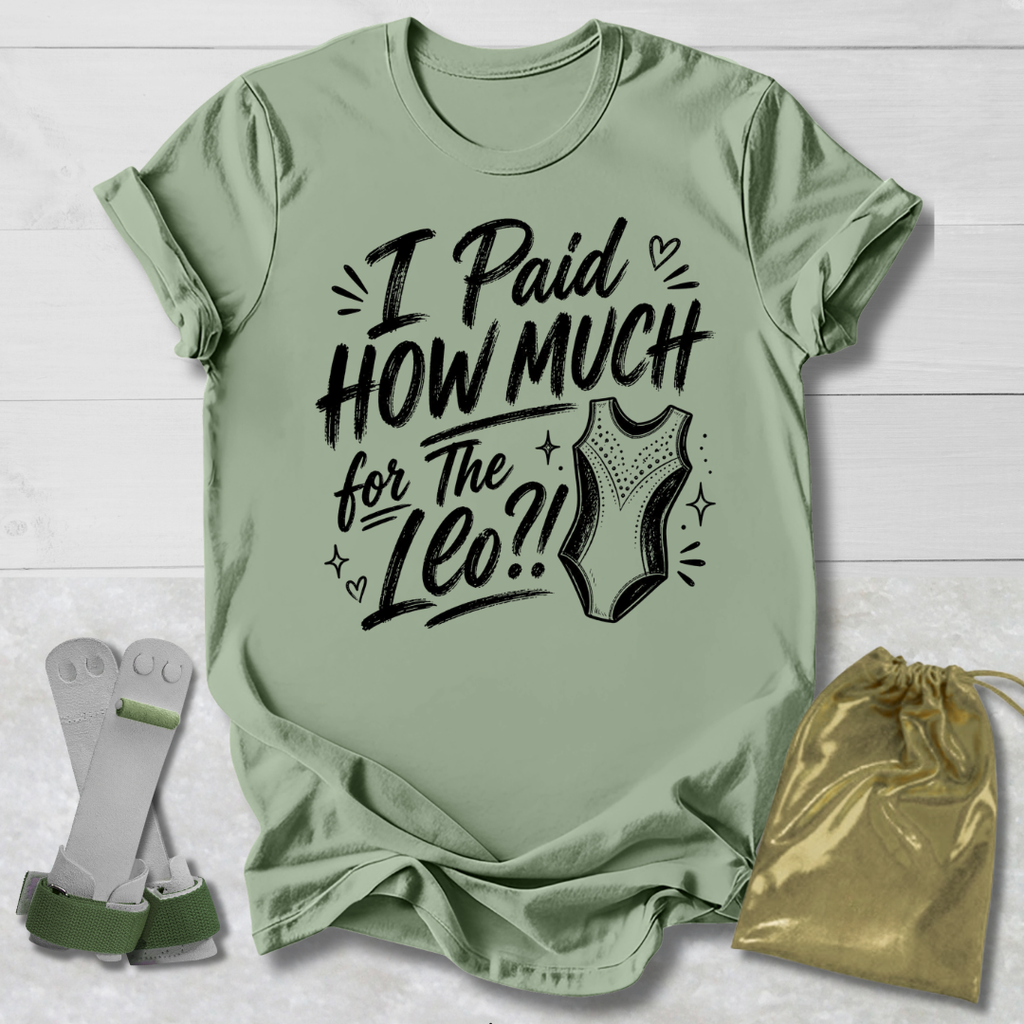 Green t-shirt with I paid how much for the gymnastics leotard?!  text and graphic, socks, and drawstring bag on a light wooden surface