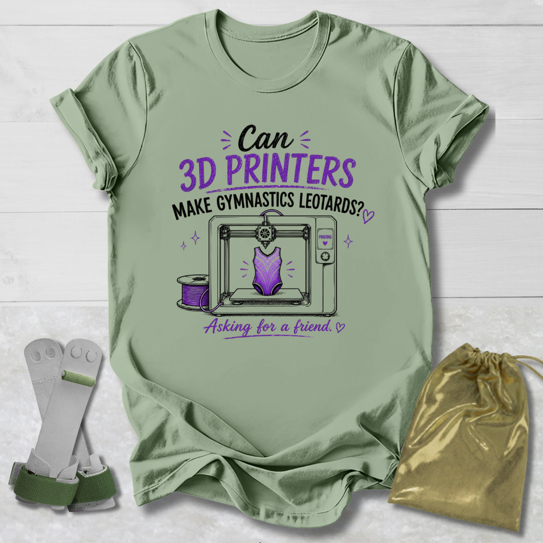 Light green t-shirt with 3D printer graphic and text on a wooden surface.