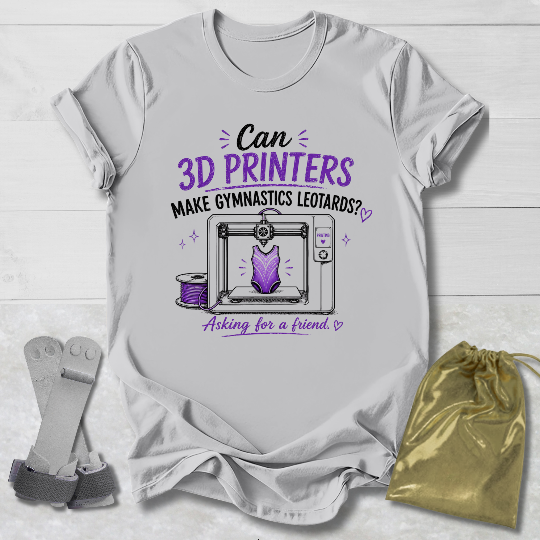 Gray t-shirt with a graphic and Can 3D Printers make gymnastics leotards text about 3D printers and gymnastics leotards on a light wooden surface.
