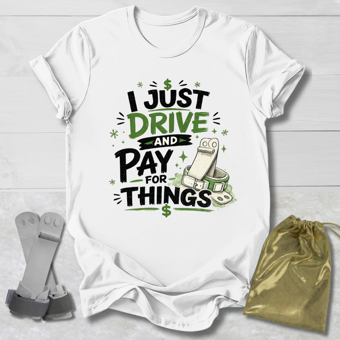 White t-shirt with humorous  I drive and pay for things gymnastics mom and dad text design on a light wooden surface, accompanied by socks and a drawstring bag.