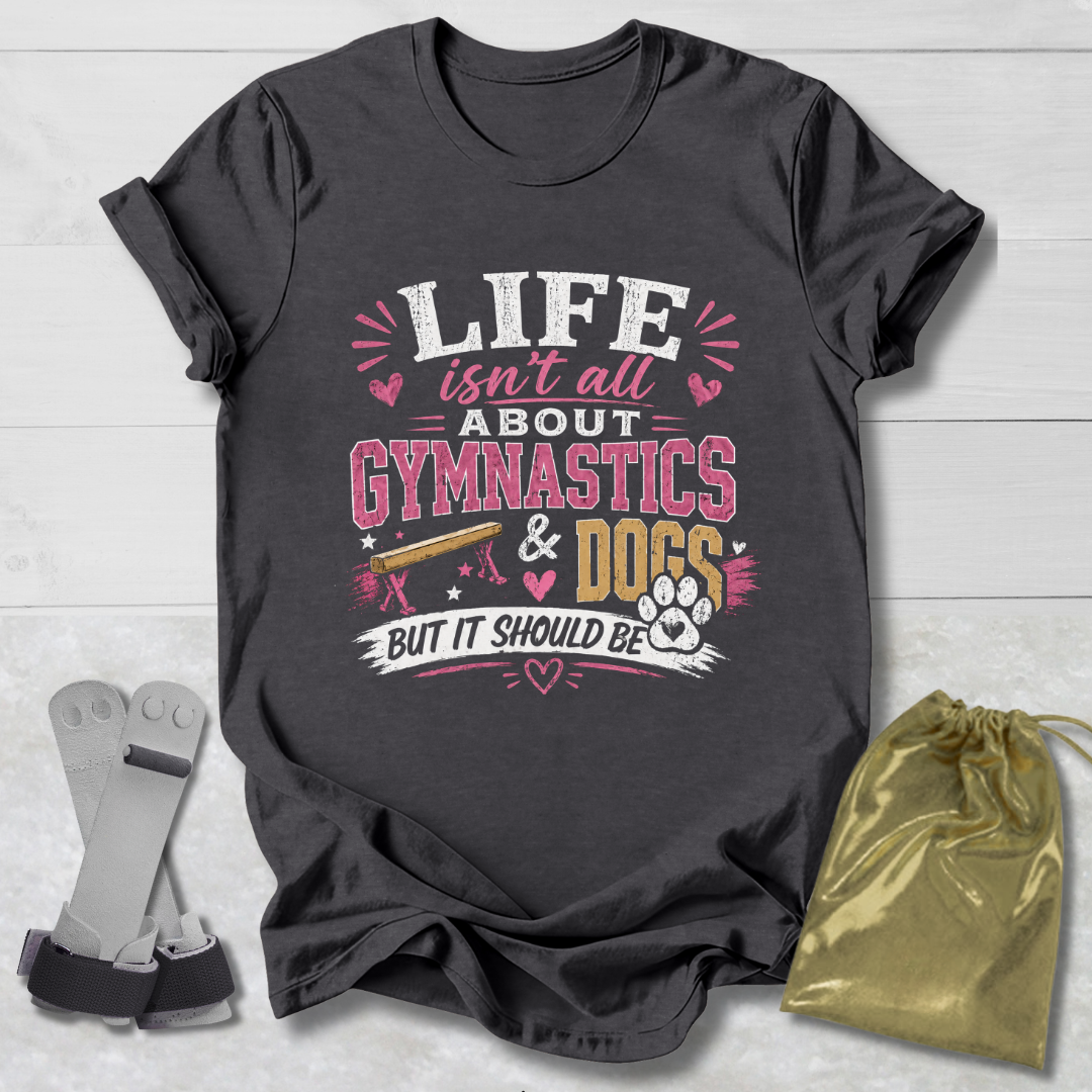 Dark gray t-shirt with 'Life isn't all about Gymnastics & Dogs but it should be' text on a light wooden surface.