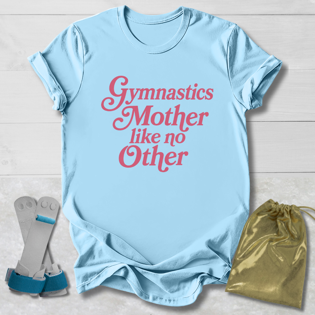 Light blue t-shirt with 'Gymnastics Mother like no Other' text, socks, and drawstring bag on a light wooden surface.