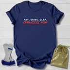 Navy blue t-shirt with 'Gymnastics Mom' text, socks, and drawstring bag on a light wooden surface
