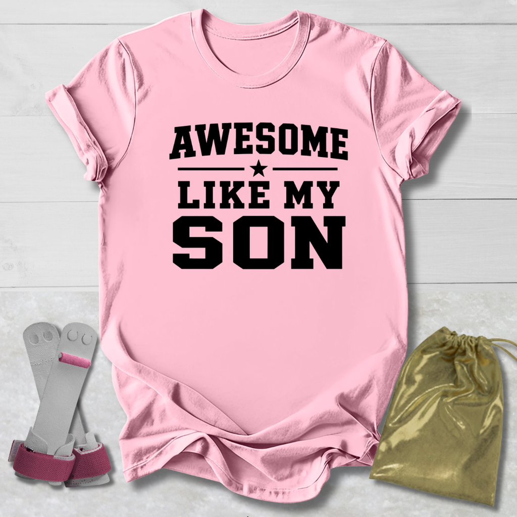 Pink t-shirt with 'Awesome Like My Son' text, socks, and drawstring bag on a light wooden surface.