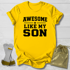Yellow t-shirt with 'Awesome Like My Son' text on a light gray background