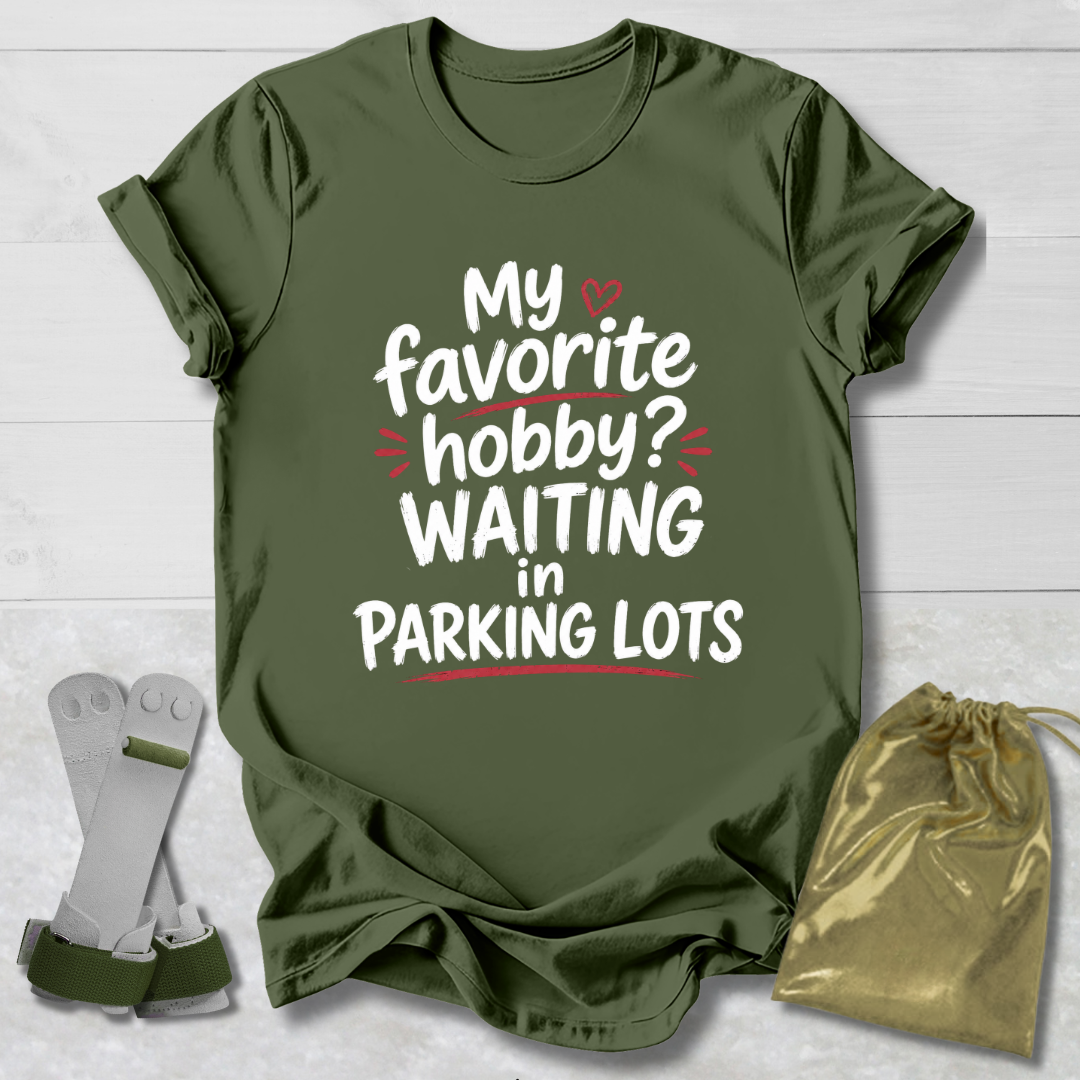 Green t-shirt with humorous text design on a wooden surface with socks and a drawstring bag.