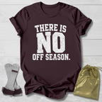 Maroon t-shirt with 'There is no off season' text, socks, and drawstring bag on a light wooden surface.