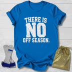 Blue t-shirt with 'There is no off season' text, socks, and drawstring bag on a light wooden surface.