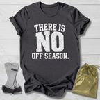 Dark gray t-shirt with 'There is no off season' text, socks, and drawstring bag on a light wooden surface.