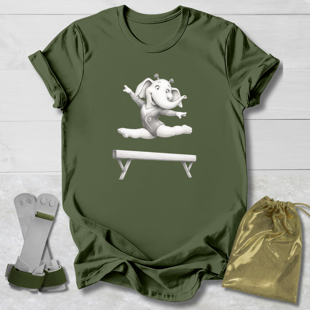 Green t-shirt with a cartoon elephant design, socks, and a drawstring bag on a light wooden surface.