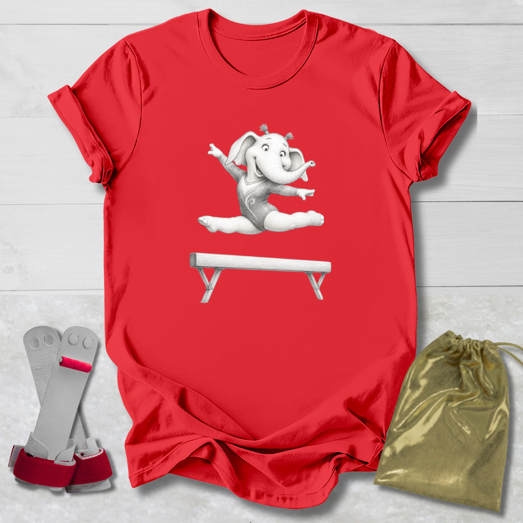 Red t-shirt with a cartoon elephant on a balance beam, socks, and a drawstring bag on a light wooden surface.