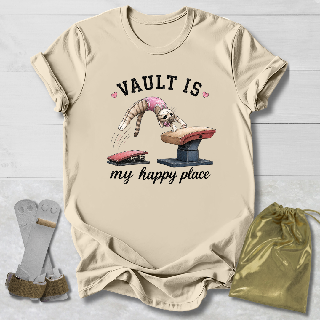 Beige t-shirt with graphic design and accessories on a light wooden surface