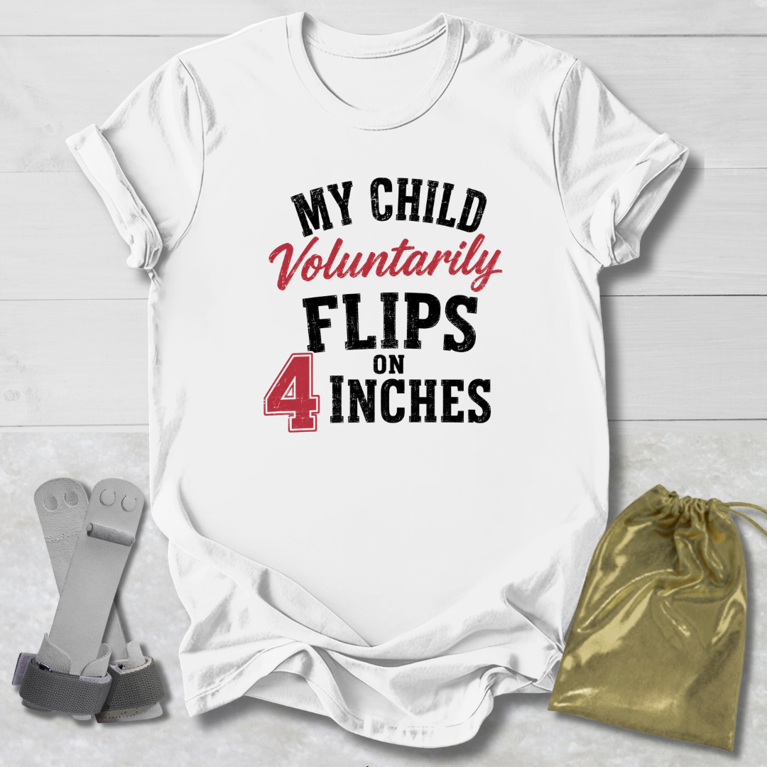 White t-shirt with humorous text design on a light wooden surface, accompanied by gray socks and a gold drawstring bag.