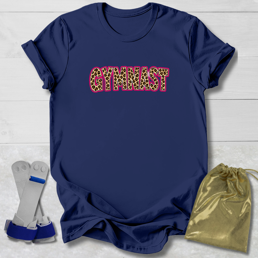 Navy blue t-shirt with 'Eat. Sleep. Breathe. Gymnastics' text, socks, and drawstring bag on a light wooden surface.