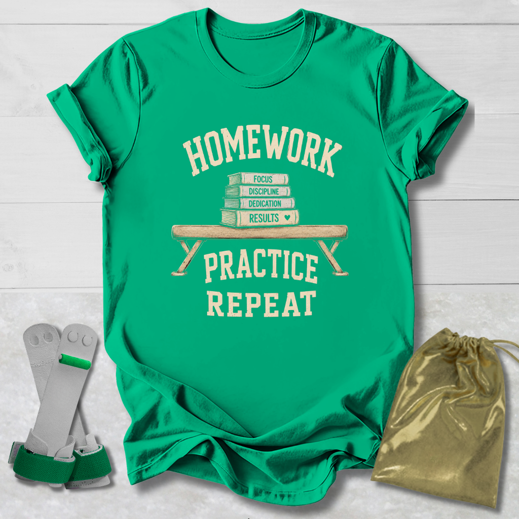 A bright green graphic T-shirt laid flat on a white wood background, with cream text reading 'HOMEWORK PRACTICE REPEAT' and a stack of books on the front. Two small accessories are placed beside it: a pair of gray and green wrist/ankle wraps and a shiny gold drawstring pouch.